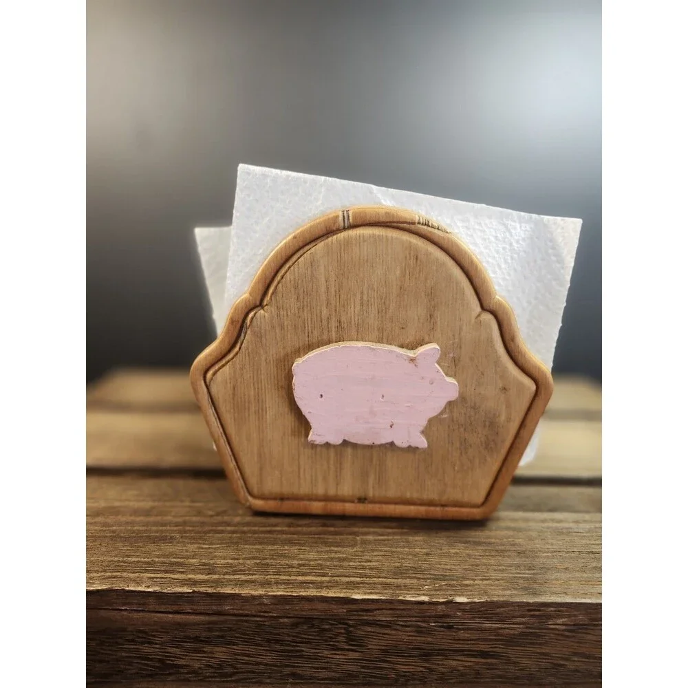 vintage wooden napkin holder features a farmhouse-style pig